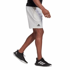 Adidas Men's Club Stretch Woven 7-Inch Shorts (White/Black) 11 Adidas Men's Club Stretch Woven 7-Inch Shorts (White/Black) -RACQUET GUYS Shop GH7222 APP on model walking white