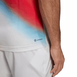Adidas Men's Melbourne FreeLift Printed Top (White/Vivid Red/Black) 20 Adidas Men's Melbourne FreeLift Printed Top (White/Vivid Red/Black) -RACQUET GUYS Shop H67126 APP on model detail 3 white