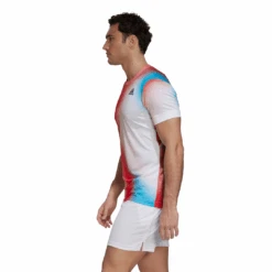 Adidas Men's Melbourne FreeLift Printed Top (White/Vivid Red/Black) 15 Adidas Men's Melbourne FreeLift Printed Top (White/Vivid Red/Black) -RACQUET GUYS Shop H67126 APP on model side white